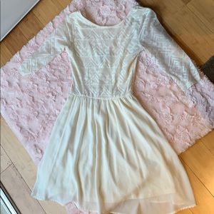 Selling a cream H&M dress cute for any occasion!